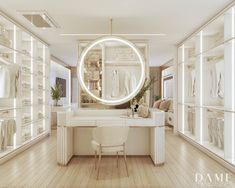 a dressing room with white walls and wooden flooring, lighted by round mirror above the desk