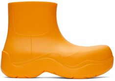 Ankle-high waterproof rubber boots in orange. · Bonded jersey lining · Treaded rubber sole Supplier color: Tangerine | Bottega Veneta Orange Puddle Boots Puddle Boots, Shoes Boots Ankle, Shoe Boutique, Hot Sneakers, Rubber Boots, Black Leather Boots, Shoe Game, Bottega Veneta, Rubber Rain Boots