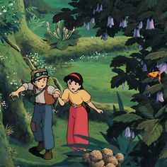 two children walking through the jungle with trees and flowers