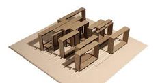 an architectural model of a building made out of cardboard and cut into smaller buildings with doors