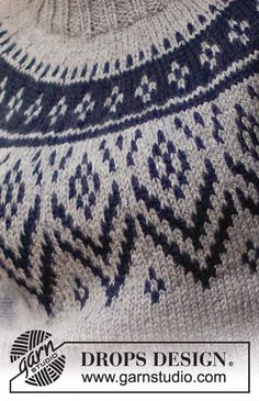 a close up of a knitted sweater with an intricate design on the front and back