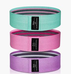 three different colored belts stacked on top of each other