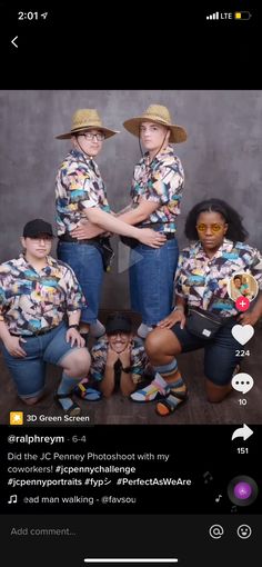 a group of people in matching shirts and hats posing for a photo with each other