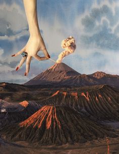 a painting of a hand reaching out to an object in the sky