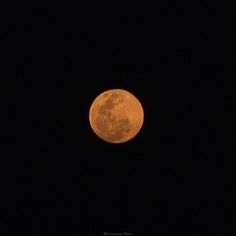 the full moon is seen in the dark sky