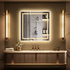 a bathroom with a sink, mirror and lights on the wall above it's counter