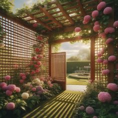 a garden with lots of pink flowers and greenery on the walls, along with a pergolated trellis