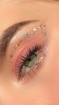 an eye with glitter on it