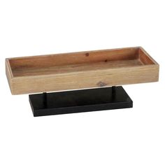 a wooden tray sitting on top of a black stand