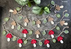 a close up of a string with leaves and mushrooms on it