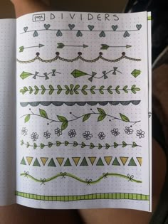 an open notebook with designs on it