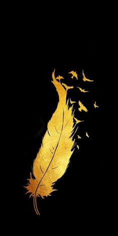 a yellow feather with birds flying around it