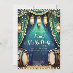 a blue and gold wedding card with lights on the stage in front of a green curtain