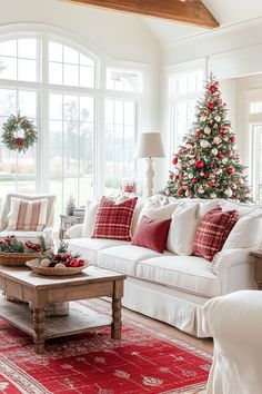 a living room filled with furniture and a christmas tree