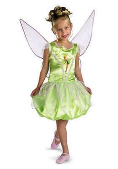 One Disney Fairies Tinkerbell Deluxe Dress Costume. Officially licensed costume manufactured by Disguise. Costume includes dress and detachable wings. Please note: This item's color may vary due to inherent manufacturing variations or your computer monitor's color settings. The item you receive will be identical or substantially similar to the item pictured in this listing. We aim to show you accurate product information. Manufacturers, suppliers, and others have provided the information listed. Tinkerbell Dress, Rainbow Costumes, Tinkerbell Costume, Tinker Bell Costume, Costume Disney, Tinkerbell Party, Disney Halloween Costumes, Disney Cosplay, Beautiful Costumes