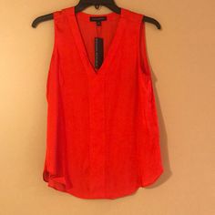 Red Sleeveless Blouse Xs New Flat Measurements: Bust 15” Length: 23.5” Casual Red V-neck Tank Top, Elegant Red V-neck Tank Top, Chic Sleeveless Orange Top, Chic Orange Sleeveless Top, Red Sleeveless Blouse For Spring, Red Casual Sleeveless Blouse, Casual Red Sleeveless Blouse, Casual Red Sleeveless Top, Orange Sleeveless Casual Blouse