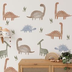 the dinosaur wall decals are in various colors and sizes