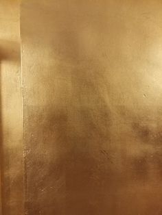 an image of a gold metallic background that looks like it could be used as a wallpaper