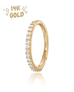 an 18k gold ring with white diamonds