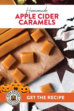 homemade apple cider caramels on a cutting board with pumpkins around them