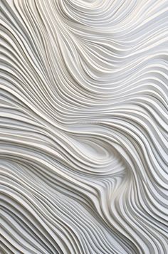 an abstract white background with wavy lines in the form of waves and curves on top of each other