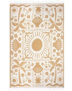 an orange and white rug with flowers on it, in front of a white background