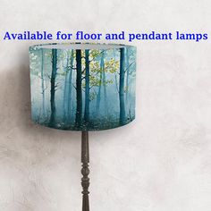 a lamp shade that is on top of a wooden table next to a wall with the words available for floor and pendant lamps