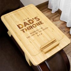 a father's throne with the words dad's throne engraved on it