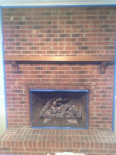 a fire place that is made out of bricks