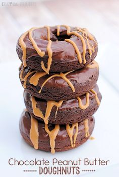 chocolate peanut butter doughnuts stacked on top of each other