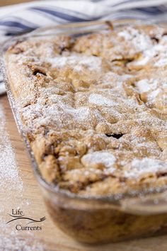 a baked dessert sitting on top of a wooden table