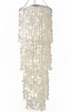 a white chandelier hanging from the ceiling with lots of bubbles on it's chain