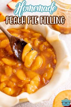 homemade peach pie filling in a bowl with a spoon