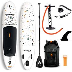 an inflatable paddle board with various accessories and items to use on the stand up paddleboard