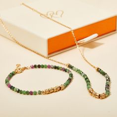 Delicate details meet eye catching gemstones with our Green Gemstone Necklace. Each necklace features a unique array of semi-precious gemstones and dainty gold details to add style to any jewelry collection.&nbsp;18K Champagne Gold PlatedChain length: 17.7, adjustable to 16.5 and 15.7Gemstone Rubis Zoisite: 3mmSent with love in a complimentary gift box Green Gemstone Bracelet, Green Gemstone Necklace, Vacation Jewelry, Grandmother Gifts, Engraved Bracelet, Crystal Stars, Holiday Jewelry, Engraved Necklace, Green Necklace