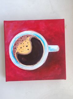 a painting of a cup of coffee on a red surface