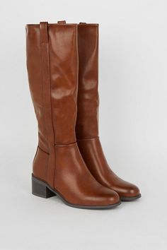 Introducing our stylish faux leather boot with a low block heel, perfect for everyday wear. Crafted from faux leather, this knee-high riding boot offers both comfort and durability. The sleek design adds a touch of sophistication to any outfit, making it a versatile choice for any occasion. With its sturdy block heel, this boot provides stability and support, ensuring a confident stride all day long. Whether you're dressing up or down, this boot is a must-have addition to your footwear collection. Boots Knee High, Faux Leather Boots, Oasis Fashion, Riding Boot, Outfit Making, Low Block Heels, Footwear Collection, Leather Boot, Boots Knee