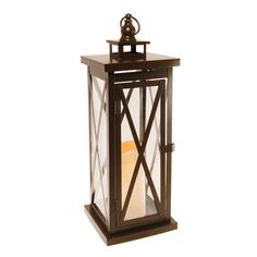 an old fashioned lantern with a candle in the middle and a light inside it on a white background