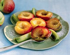 a plate with apples and bananas on it