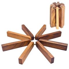 four pieces of wood are arranged in the shape of a flower