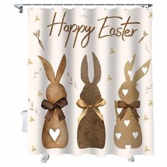 a happy easter shower curtain with three bunnies