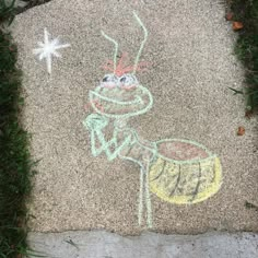 chalk drawing of a cartoon character on the sidewalk