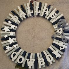 a wreath made out of letters and stars