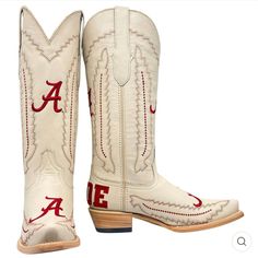 New W/ Tags, Never Worn! Will Ship In Original Box. Introducing The Naomi Cowgirl Boots- Officially Licensed For The University Of Alabama Crimson Tide. The Ultimate Blend Of School Pride And Southern Charm, These Boots Are Adorned With Vibrant Crimson Stitch Patterns And The Iconic Alabama Logo. Designed To Make A Bold Statement On Gamedays And In Everyday Life, These Boots Are More Than Just Footwear; They're A Way To Embrace Your Crimson Tide Spirit With Every Step You Take. Roll Tide! Color: Alabama Tuscaloosa, Alabama Logo, Vince Camuto Boots, Color Bone, The University Of Alabama, Uniqlo Bags, Leather Heeled Boots, Tall Riding Boots, Swim Shoes