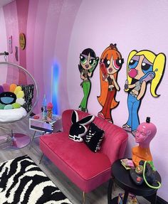 a living room filled with furniture and cartoon characters on the wall