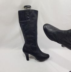 Introducing black cadluke boots, with a round toe. The back has a wide elastic band, which can be stretched to fit your shin. In these beautiful knee-length leather boots, you can conquer the world! Vintage 90's-00's Comfortable heel. Made of soft leather inside and out. Limited edition. Whole, in good condition. Additional photos can send on request. Materials: leather The circumference calf width: 16 - 17 Inches Heel height: 3,4 Inches Boots height with heel included: 18 inches Size - (10,5 US Women Heel Boots, Women High Heels, High Heels Shoes, Womens Knee High Boots, Comfortable Heels, Boots Women, Heels Shoes, Black Leather Boots, 90s Vintage