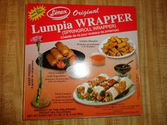 the menu for lumpia wrapper is displayed on a wooden table with an orange background