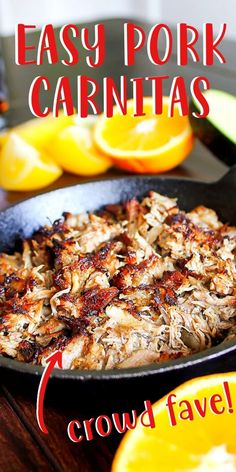 an easy pork carnitas in a cast iron skillet with oranges and avocado