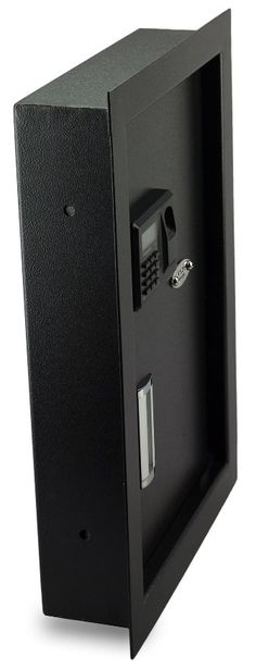 an open black box with a phone on the door and keypads in it