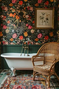 a bathroom with floral wallpaper and a wicker chair next to the bathtub